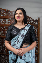 Sky Blue Crepe Silk Saree with Black Floral Print