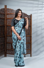 Sky Blue Crepe Silk Saree with Black Floral Print