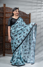 Sky Blue Crepe Silk Saree with Black Floral Print